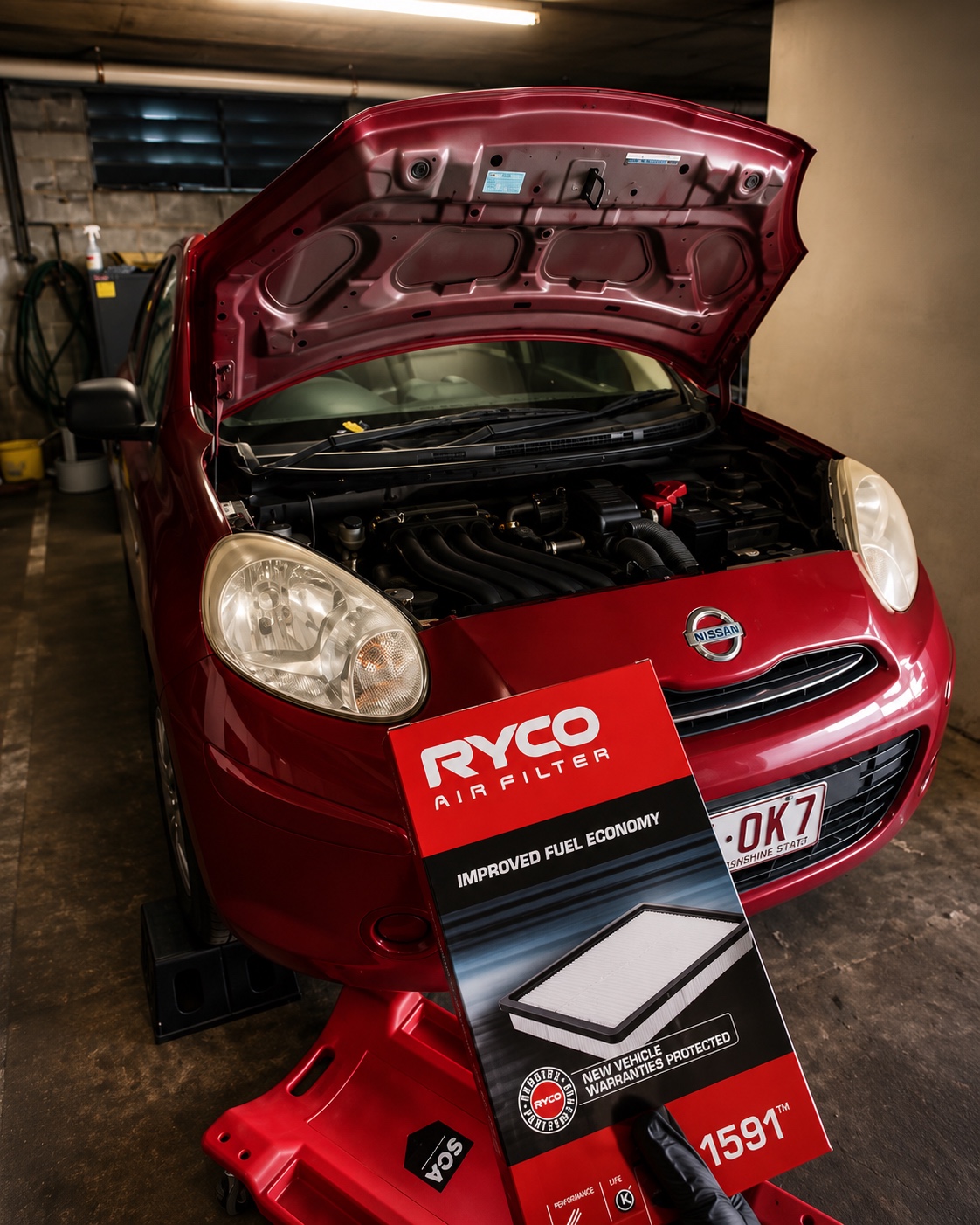 Silver vehicle prepared for engine-related service